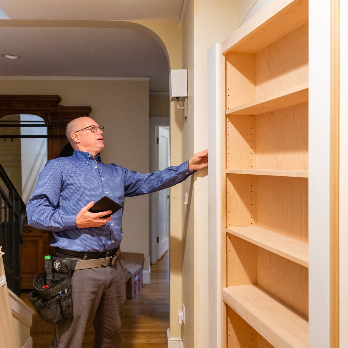 David inspecting interior of a home